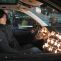 Using cheap christmas lights for a softer source in a car interior.